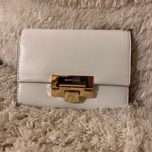 Michael Kors Wallet. White Leather with Gold accents. brand new and never used!